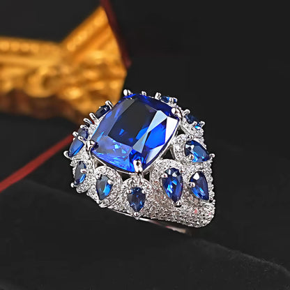 Celestial Sapphire Halo: 8Carat Cubic Zirconia Ring, 18k White Gold