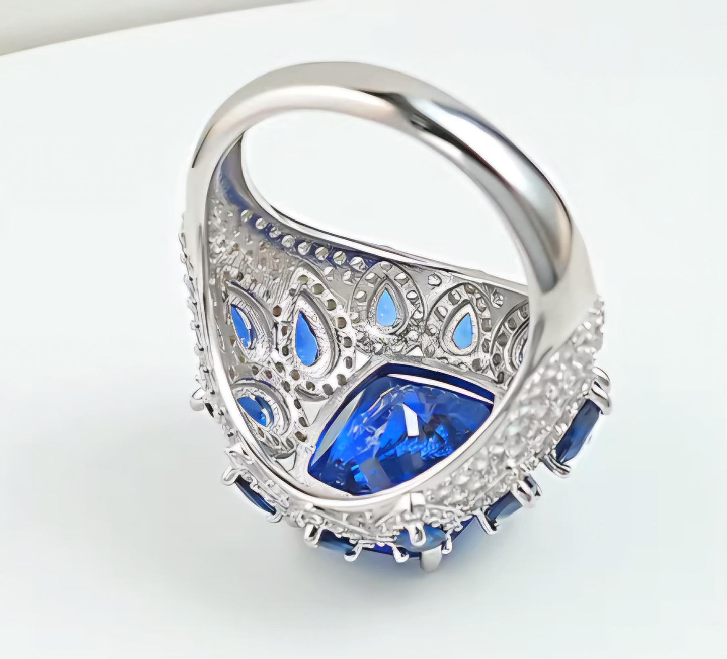 Celestial Sapphire Halo: 8Carat Cubic Zirconia Ring, 18k White Gold