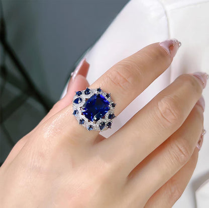 Celestial Sapphire Halo: 8Carat Cubic Zirconia Ring, 18k White Gold